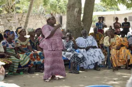 Woman speaking at PROGREEN Donor Meeting. Ghana; June 2023 © Liam Mullins